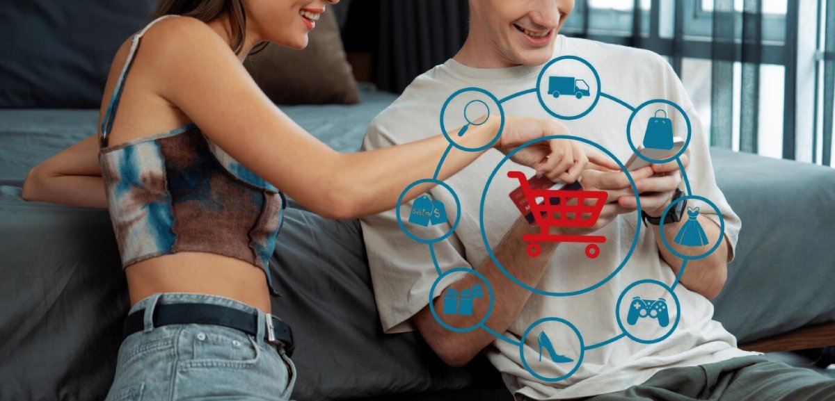 Young couple sitting on sofa, interacting with a futuristic online shopping interface with various e-commerce icons.