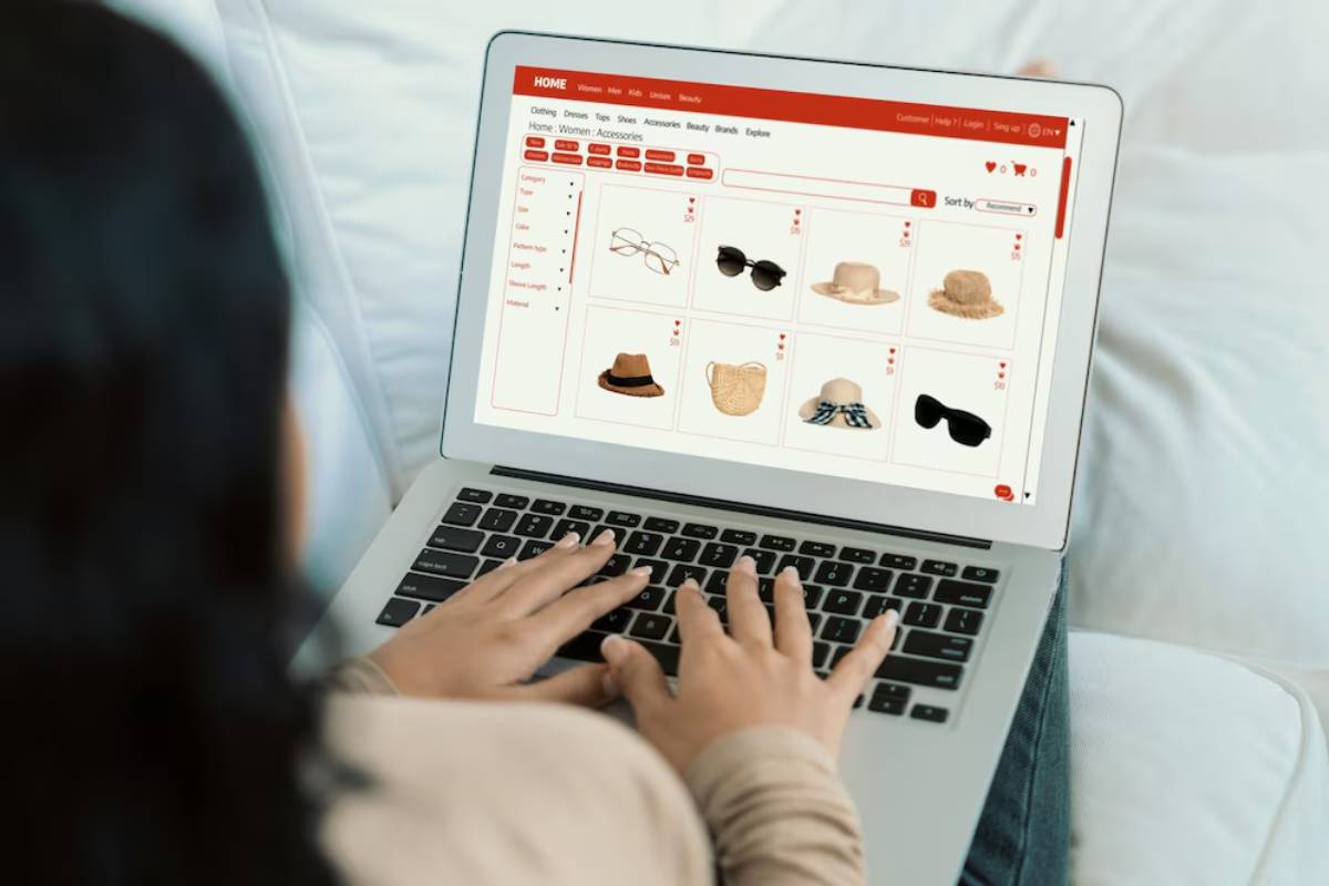 Person shopping online for accessories on a laptop.